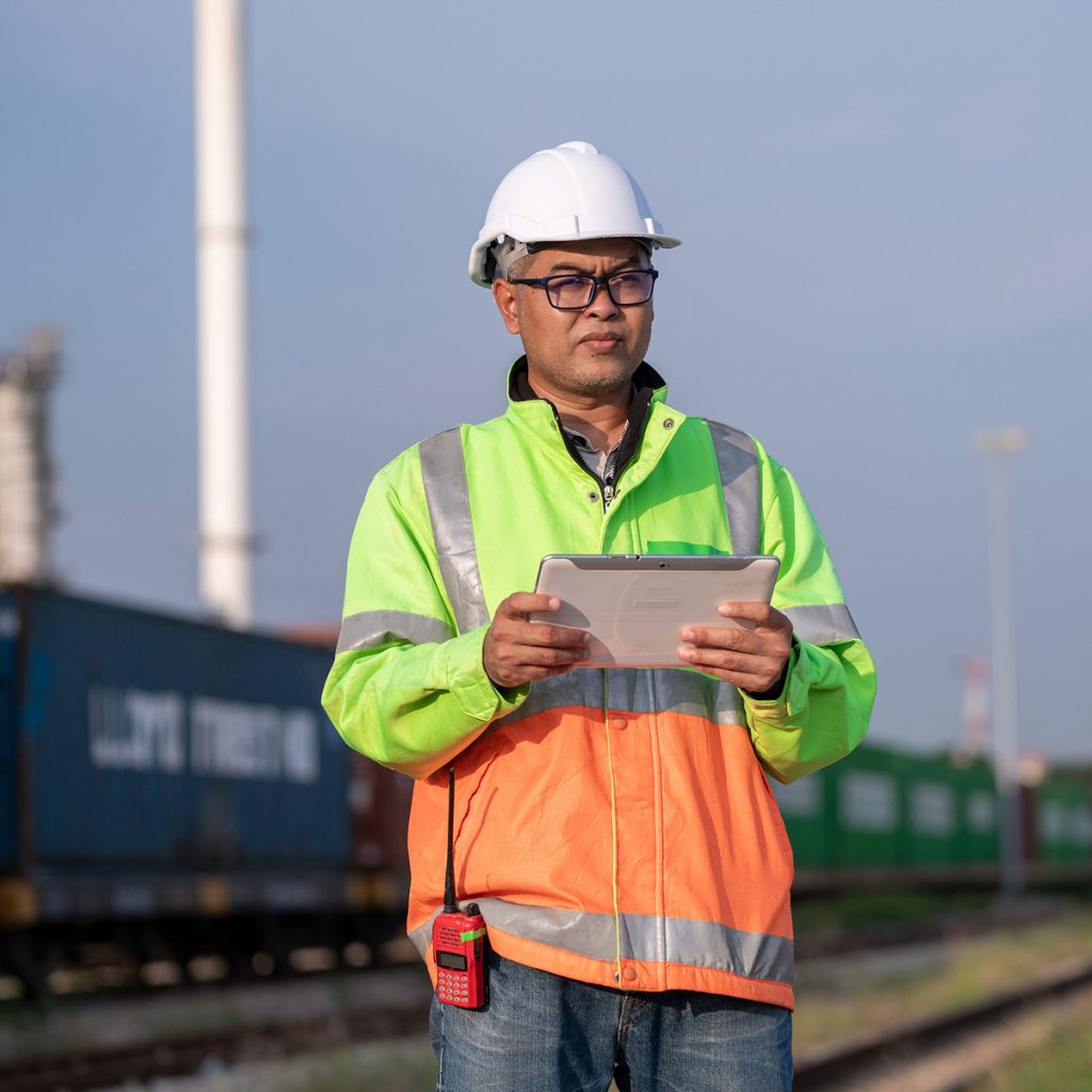 Freight worker with tablet
