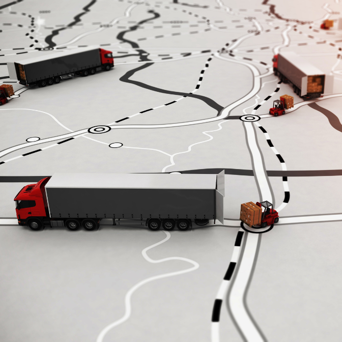 Model trucks on a map with highways