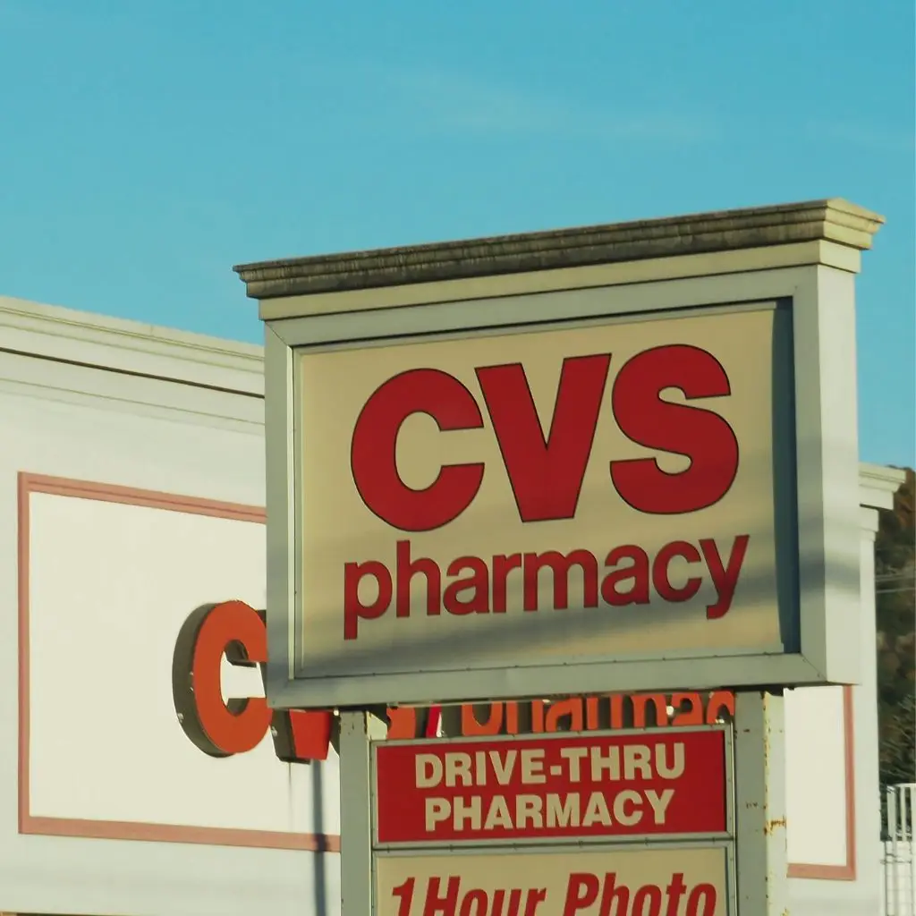 Image of the outside of a CVS store with a drive-thru pharmacy